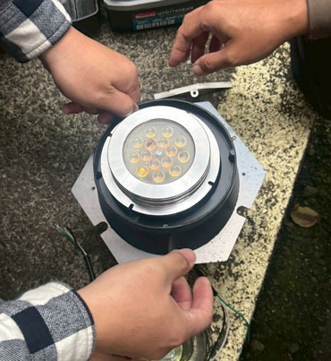 Light The World industrial lamp repair, practicing circular economy to reduce e-waste